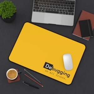 desk mat "debugging on all fronts." yellow programmer mousepad for developers